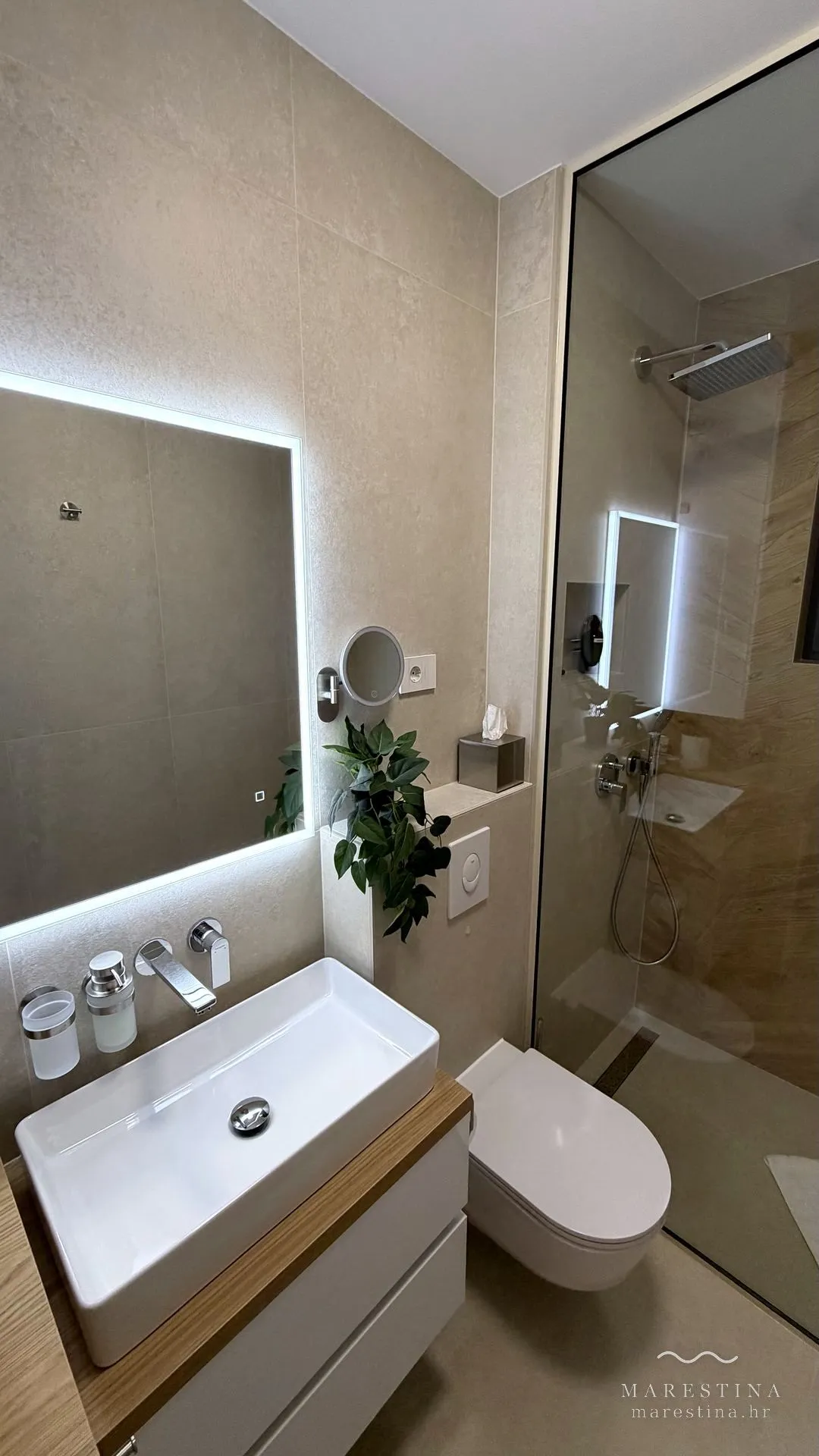 Second bathroom with walk-in shower and washing machine