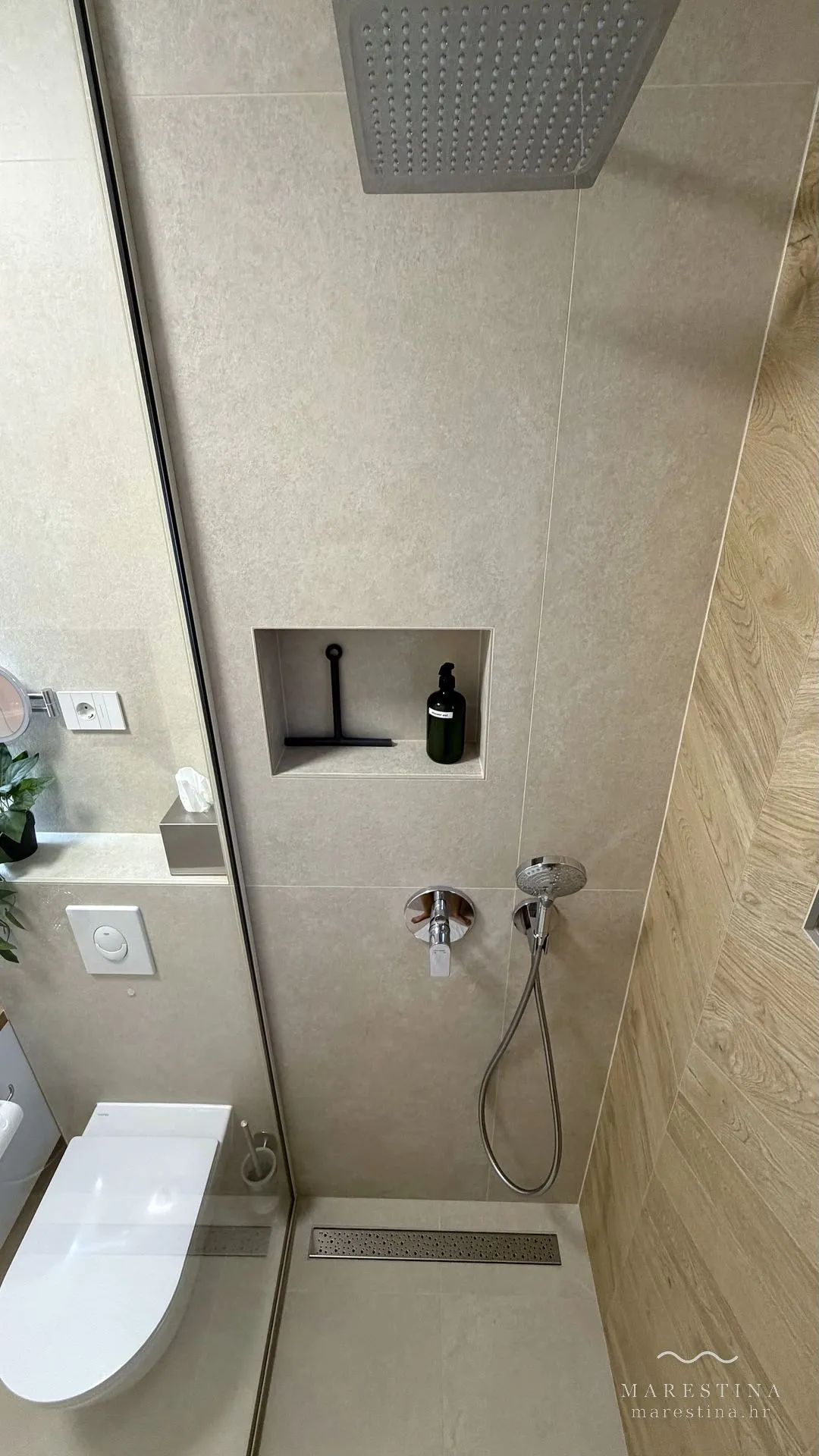 Second bathroom with walk-in shower and washing machine