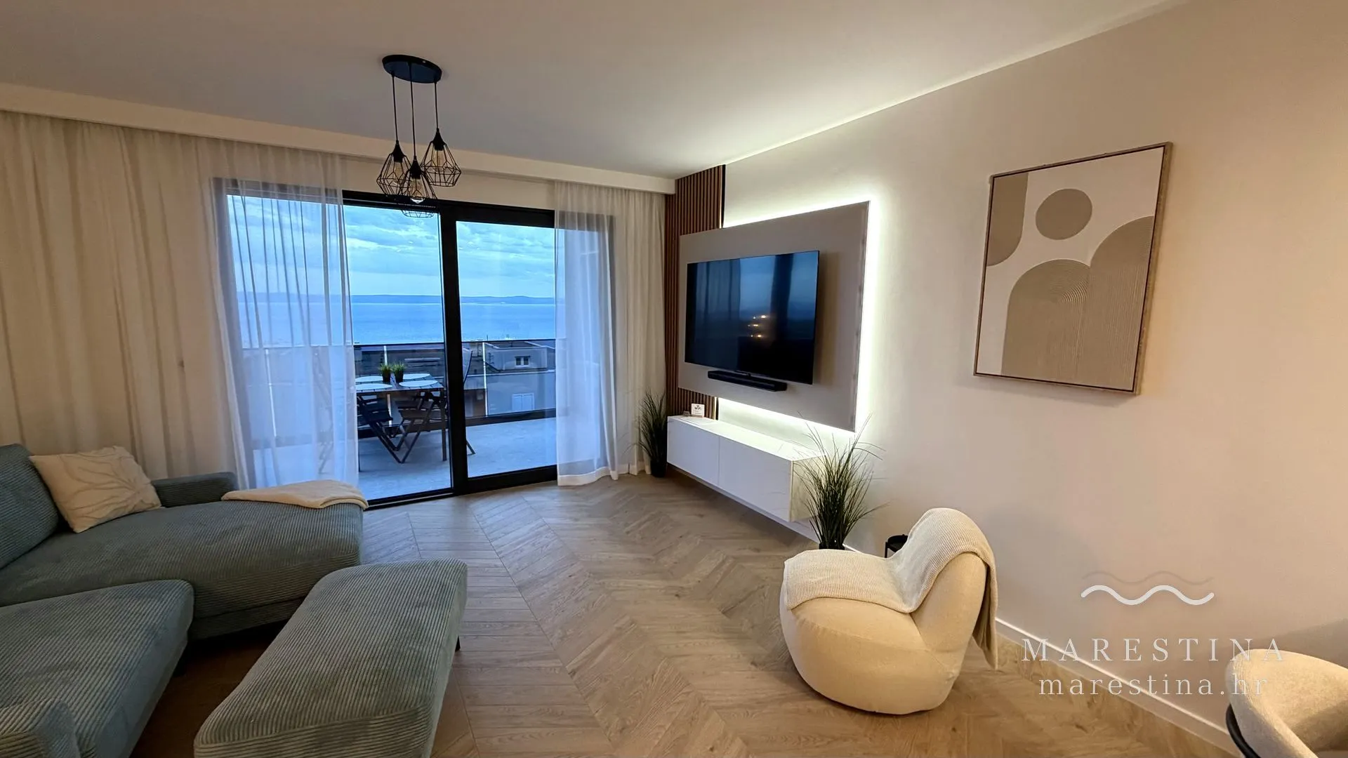 Open-plan living and dining area at Marestina